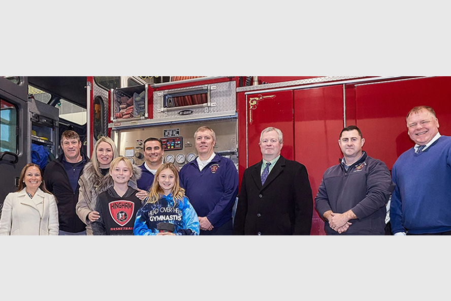 Cutter Family and Hingham Officials in front of firetruck